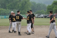 Team celebrates a huge 9-inning win! - (6-13-05)